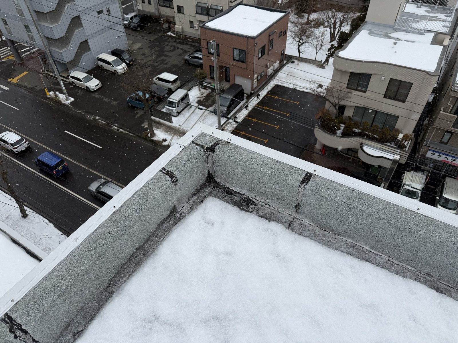無落雪屋根の上から見た札幌の街